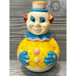 Vintage Yellow Clown Roly Poly Toy: Retro Nursery Jingle